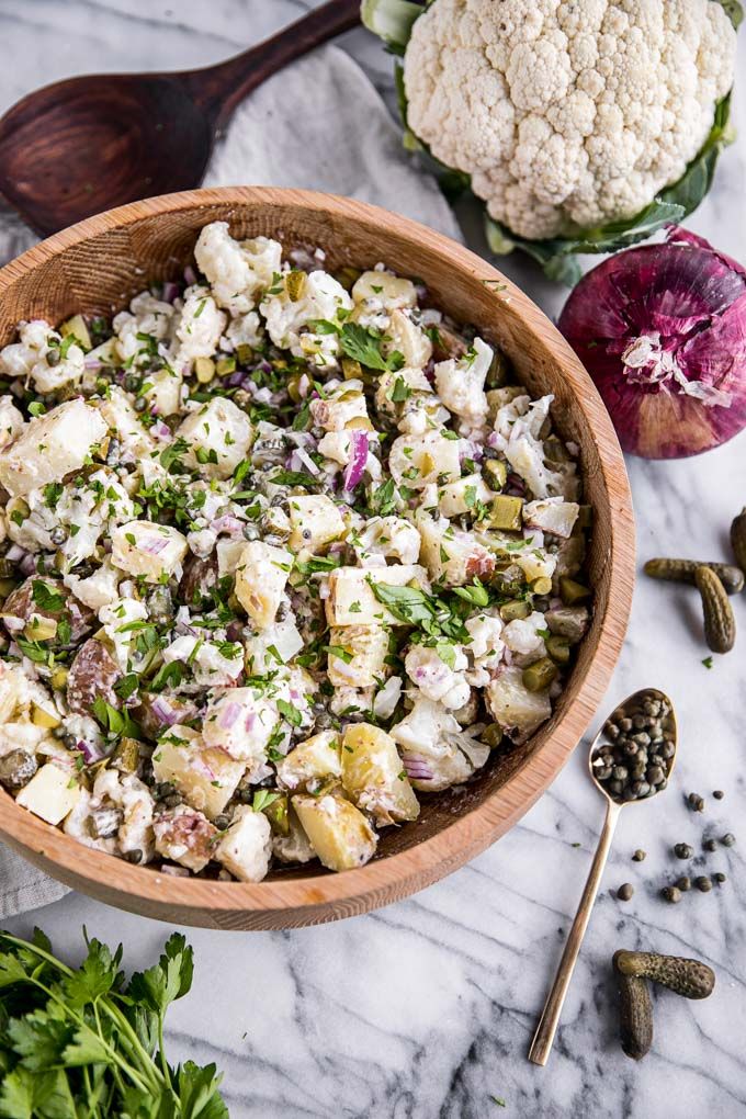 This easy Paleo cauliflower potato salad is low-carb and healthy, yet creamy and...